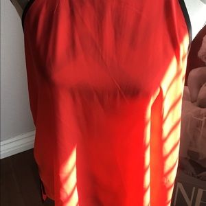 Coral sleeveless blouse